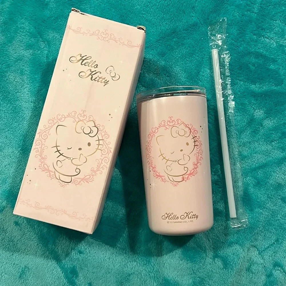 Sanrio Hello Kitty 16 oz tumbler with straw and straw cap.  Brand new in box